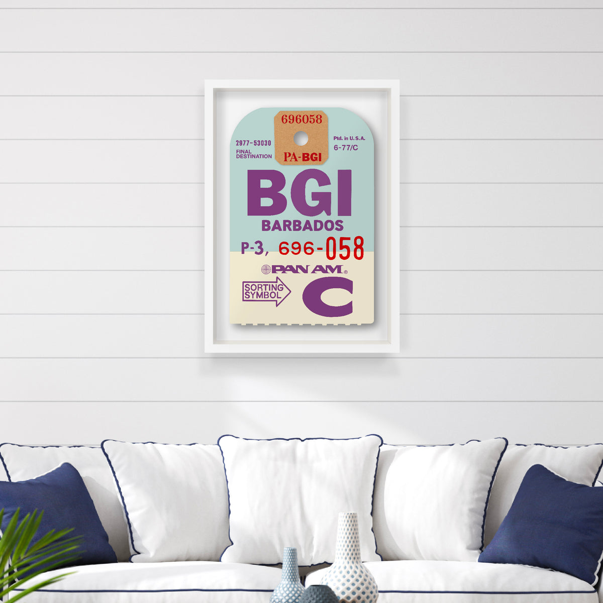 Limited-edition archival print of a Pan Am “BARBADOS” luggage tag by Ella Freire, inspired by the original 1960s design, supersized in two framed sizes, float-mounted to enhance its three-dimensional effect; officially licensed by Pan Am with signed certificate included.