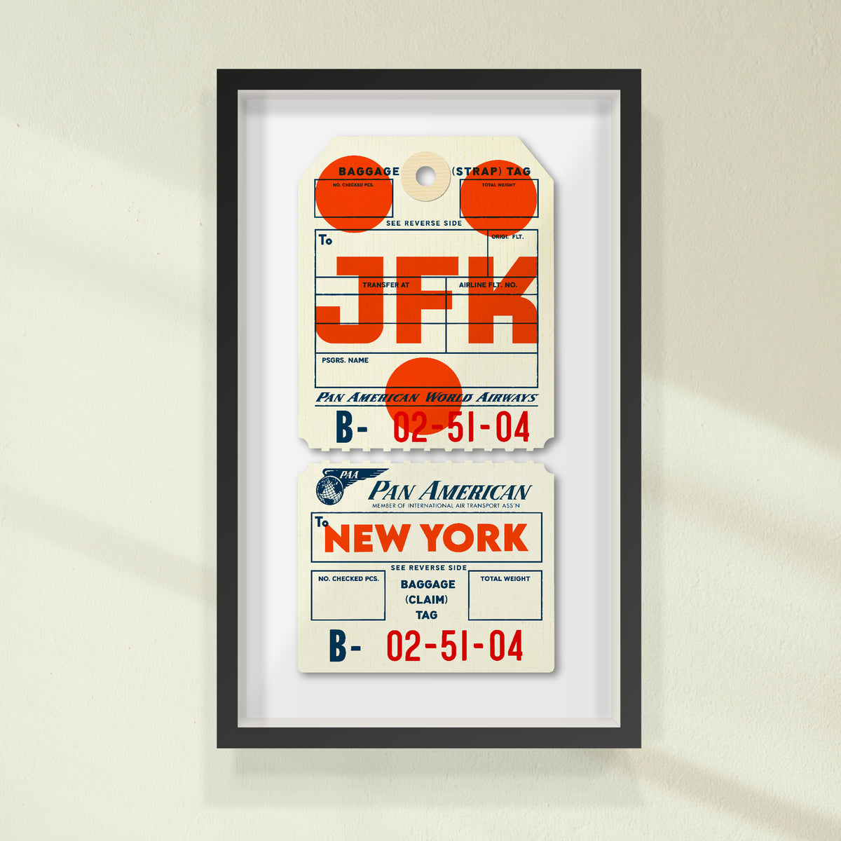 Limited-edition, 2-part, archival print of a Pan Am “JFK New York” luggage tag by Ella Freire, inspired by the original 1960s design, supersized in one framed size only, float-mounted to enhance its three-dimensional effect; officially licensed by Pan Am with signed certificate included.