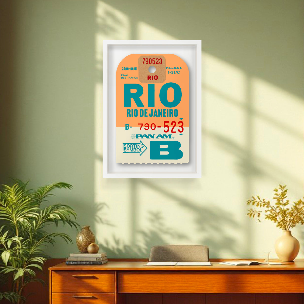 Limited-edition archival print of a Pan Am “RIO” luggage tag by Ella Freire, inspired by the original 1960s design, supersized in two framed sizes, float-mounted to enhance its three-dimensional effect; officially licensed by Pan Am with signed certificate included.