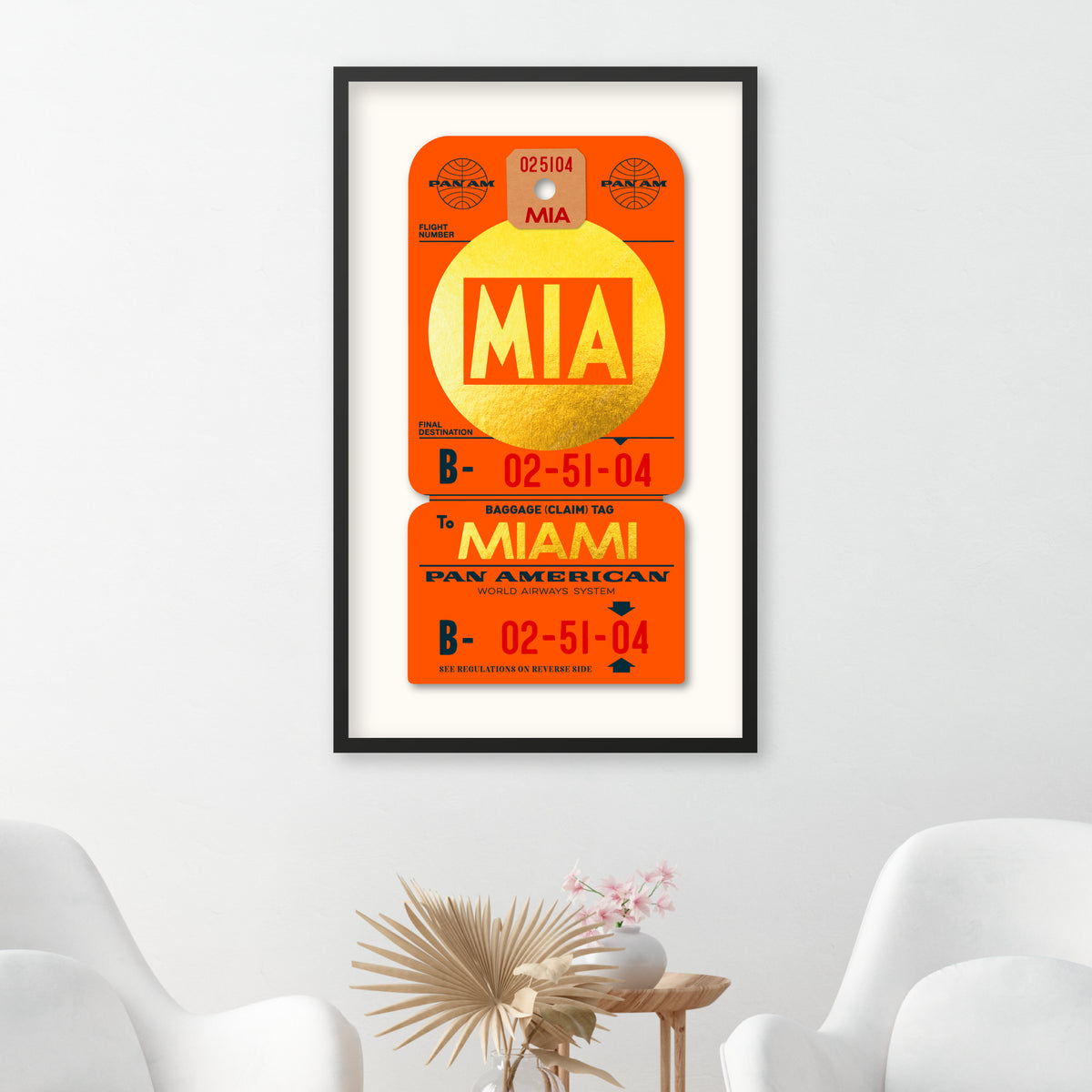 Limited Edition archival print of Pan Am “Miami” luggage tag by Ella Freire, inspired by the 1960s art deco design, printed on shiny gold paper, float-mounted and framed to enhance the 3D effect; officially Pan Am licensed with signed certificate.
