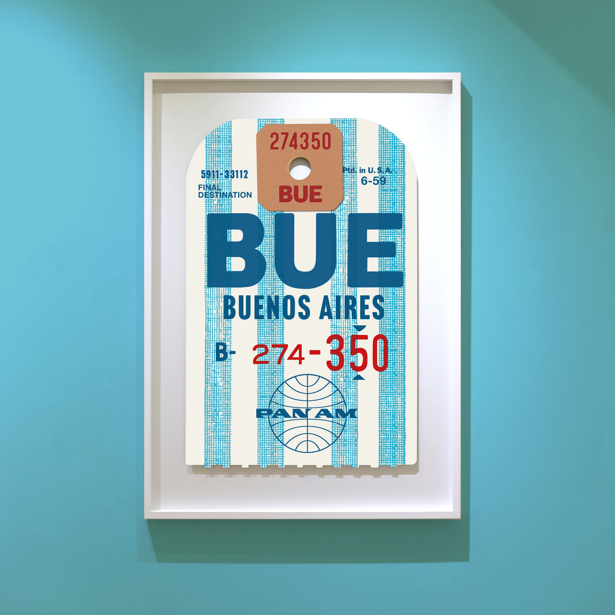 Limited-edition archival print of a Pan Am “Buenos Aires” luggage tag by Ella Freire, inspired by the original 1960s design, supersized in two framed sizes, float-mounted to enhance its three-dimensional effect; officially licensed by Pan Am with signed certificate included.