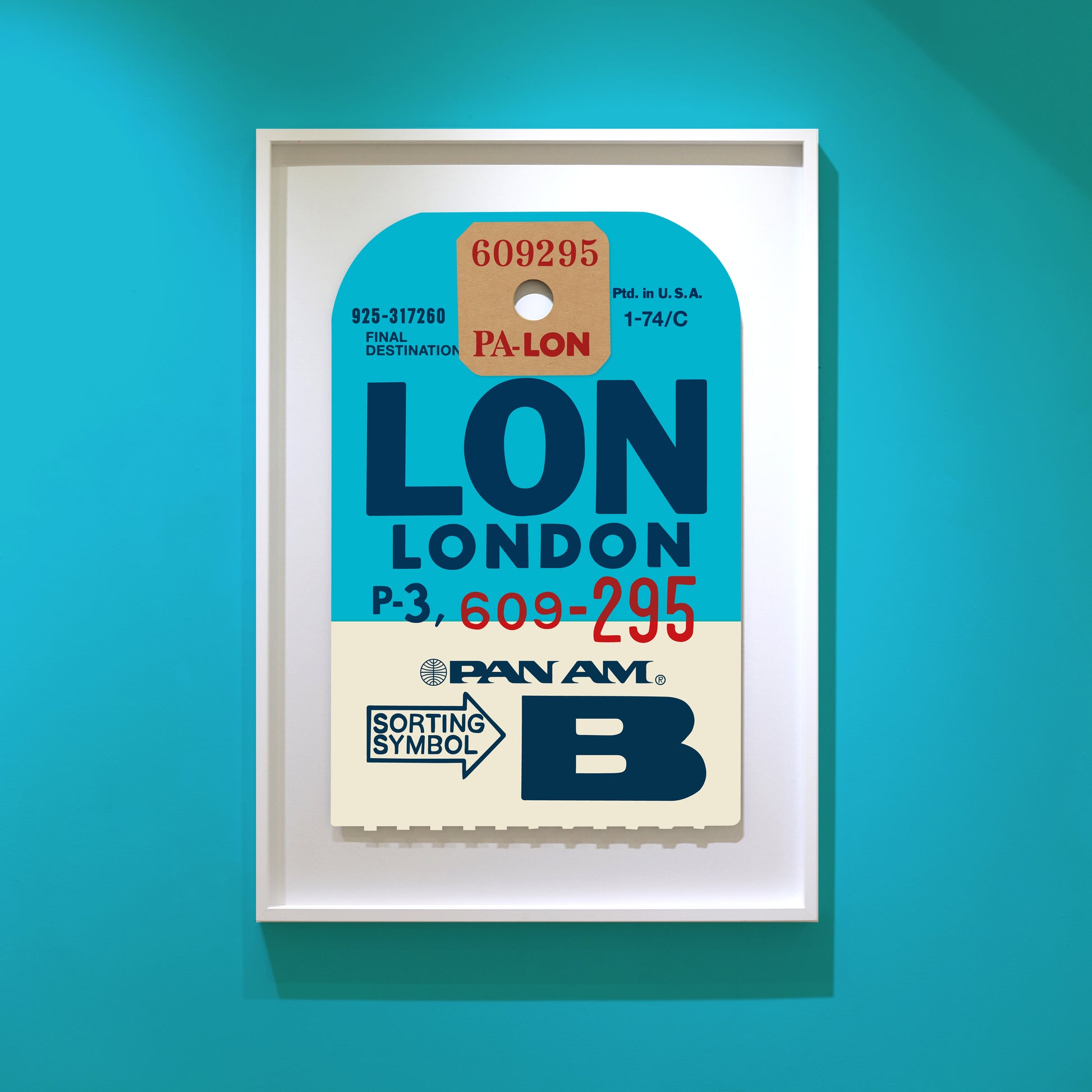Limited-edition archival print of a Pan Am “London” luggage tag by Ella Freire, inspired by the original 1960s design, supersized in two framed sizes, float-mounted to enhance its three-dimensional effect; officially licensed by Pan Am with signed certificate included.