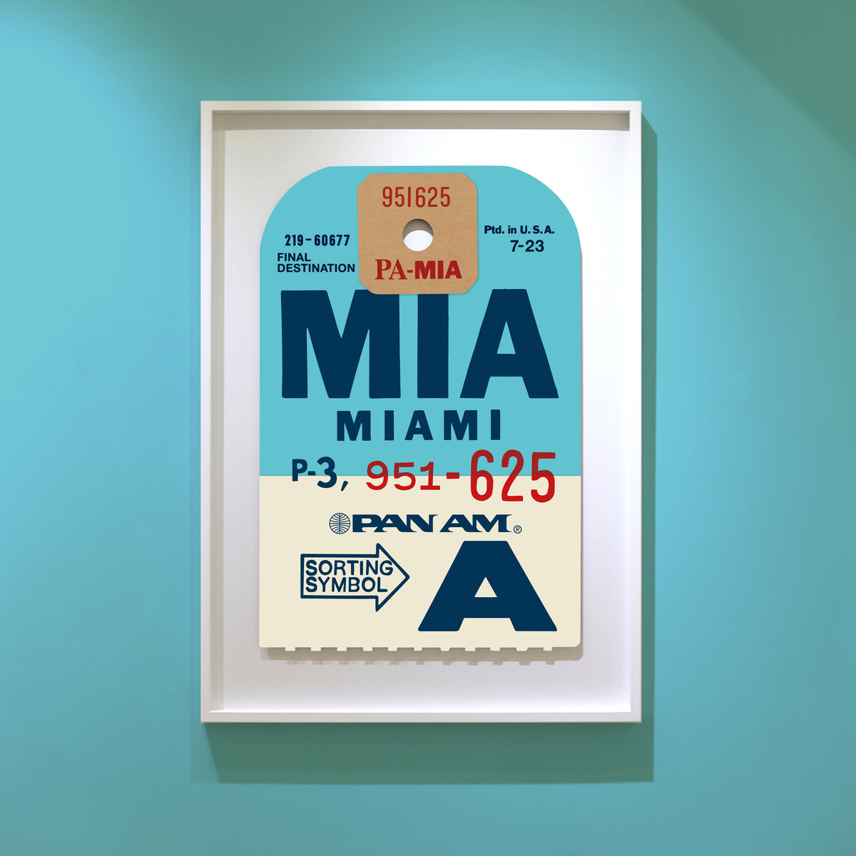 Limited-edition archival print of a Pan Am “Miami” luggage tag by Ella Freire, inspired by the original 1960s design, supersized in two framed sizes, float-mounted to enhance its three-dimensional effect; officially licensed by Pan Am with signed certificate included.