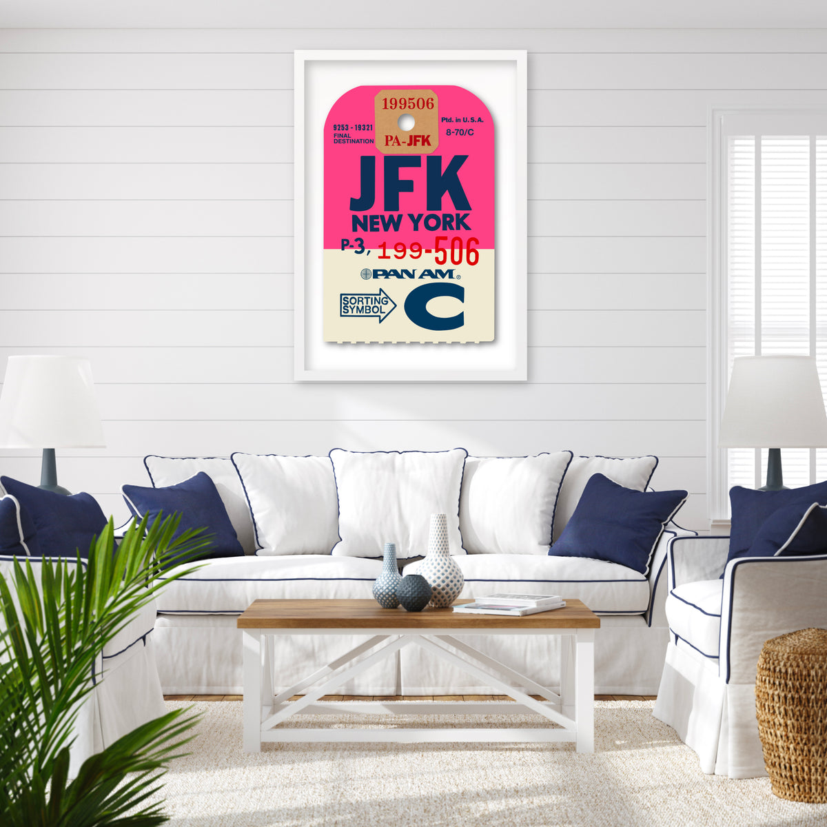 Limited-edition archival print of a Pan Am “JFK New York” luggage tag by Ella Freire, inspired by the original 1960s design, supersized in two framed sizes, float-mounted to enhance its three-dimensional effect; officially licensed by Pan Am with signed certificate included.