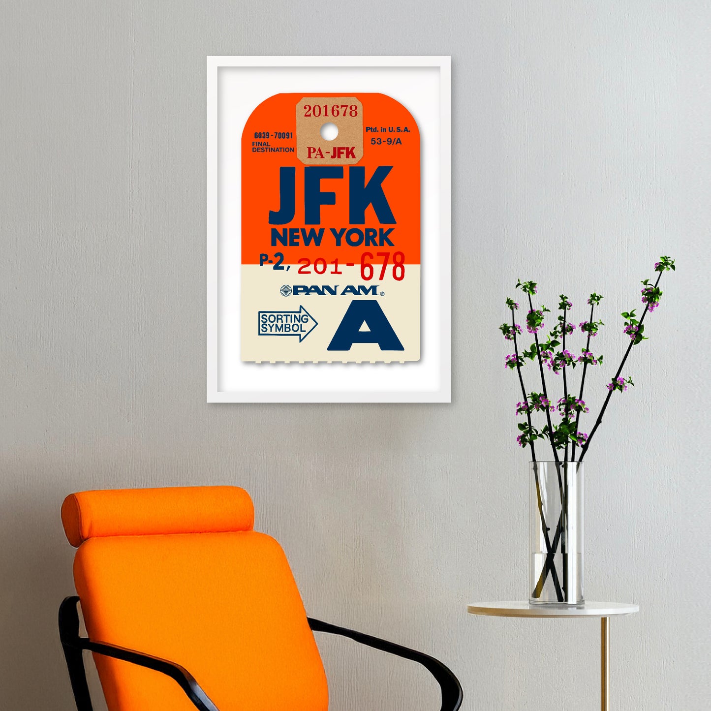 Limited-edition archival print of a Pan Am “JFK New York” luggage tag by Ella Freire, inspired by the original 1960s design, supersized in two framed sizes, float-mounted to enhance its three-dimensional effect; officially licensed by Pan Am with signed certificate included.