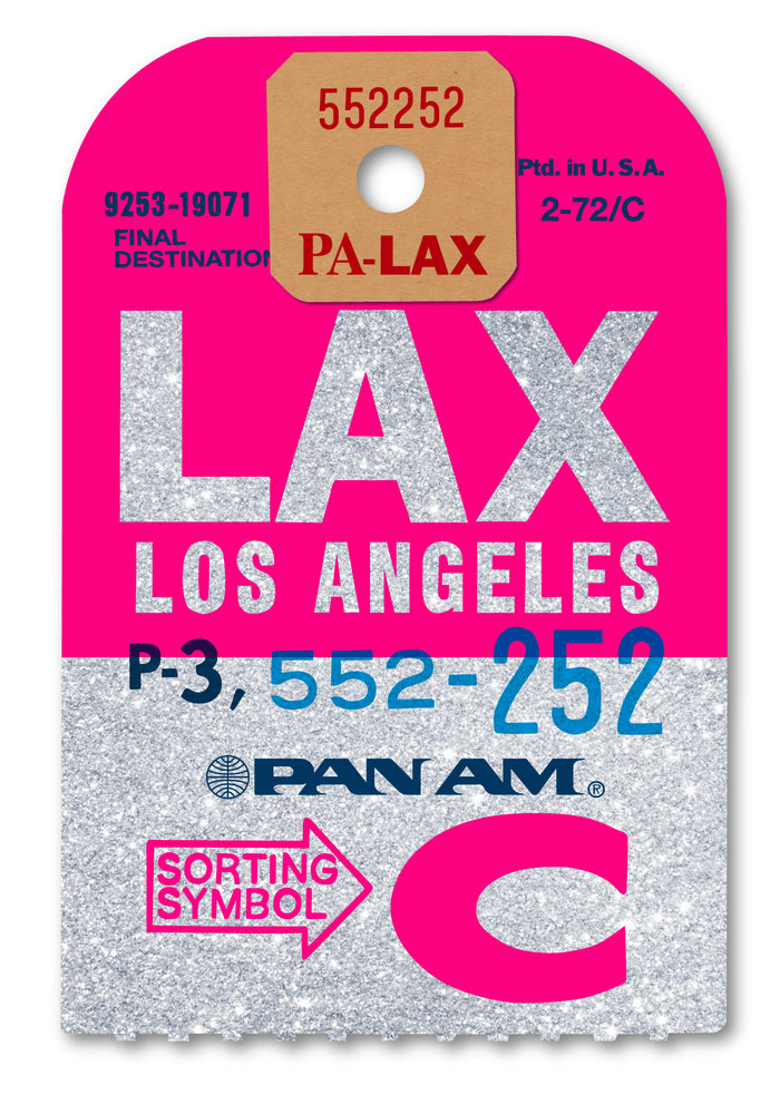 Limited-edition archival print onto sliver glitter paper of a Pan Am “Los Angeles” luggage tag by Ella Freire, inspired by the original 1960s design, supersized to a large size, float-mounted to enhance its three-dimensional effect; officially licensed by Pan Am with signed certificate included.