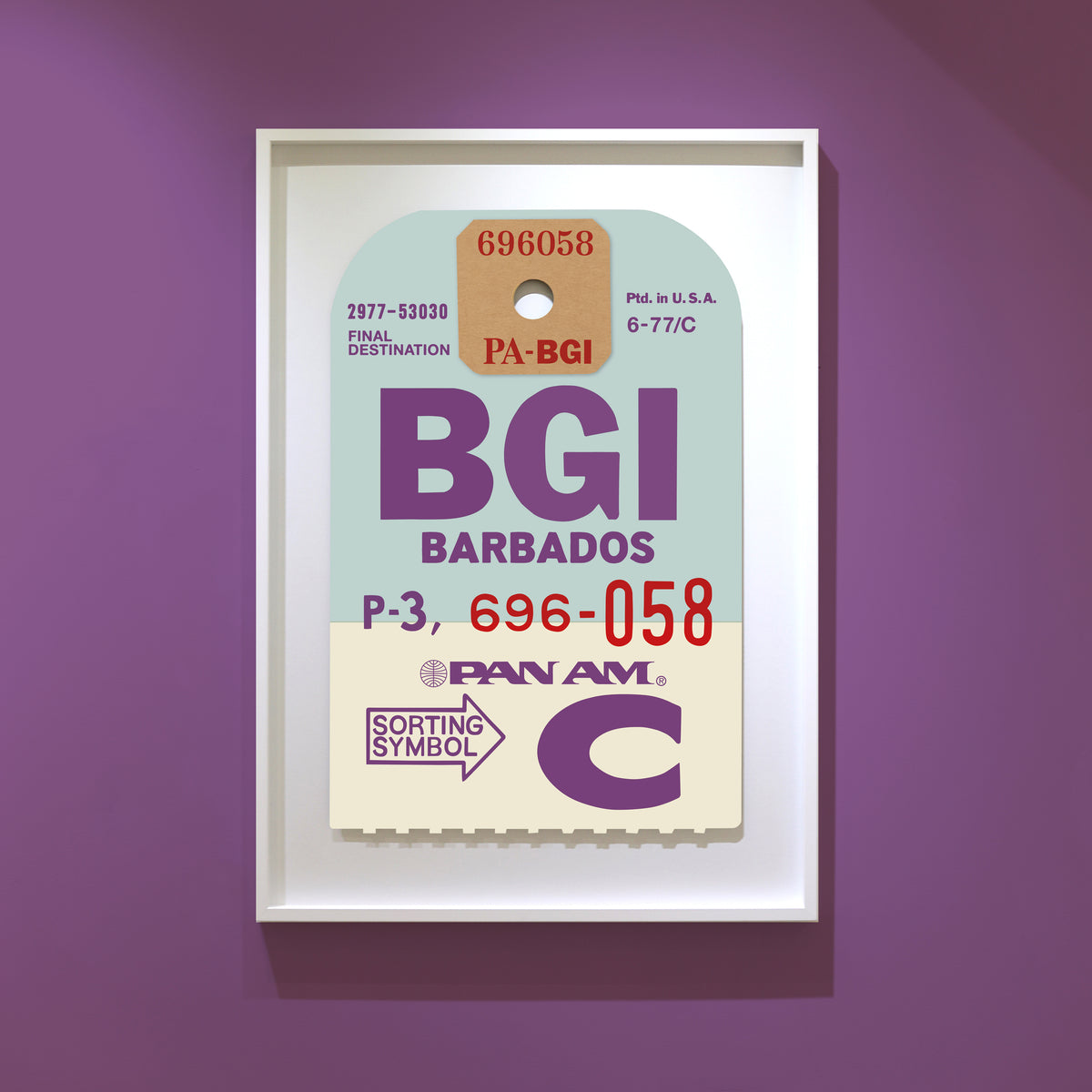 Limited-edition archival print of a Pan Am “BARBADOS” luggage tag by Ella Freire, inspired by the original 1960s design, supersized in two framed sizes, float-mounted to enhance its three-dimensional effect; officially licensed by Pan Am with signed certificate included.