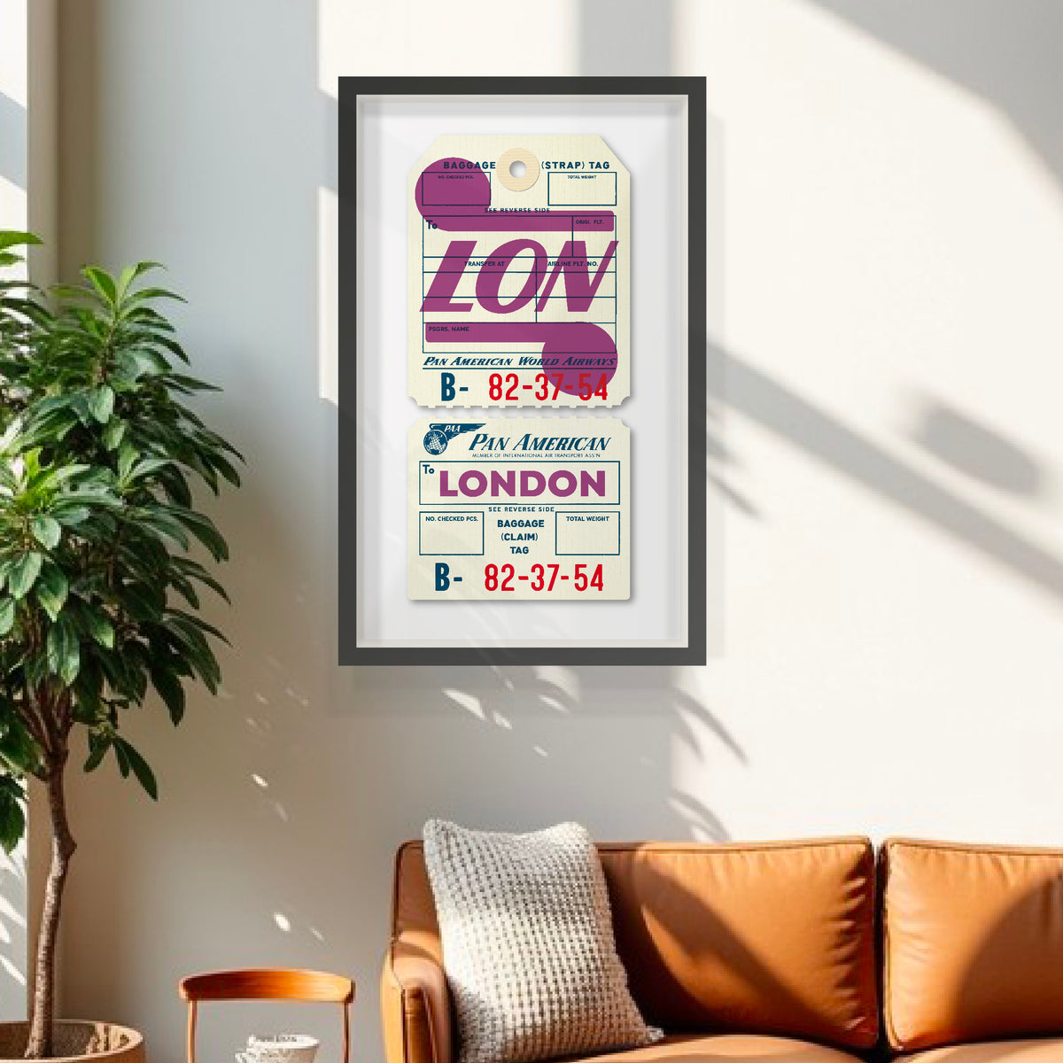 Limited-edition, 2-part, archival print of a Pan Am “London” luggage tag by Ella Freire, inspired by the original 1960s design, supersized in one framed size only, float-mounted to enhance its three-dimensional effect; officially licensed by Pan Am with signed certificate included.