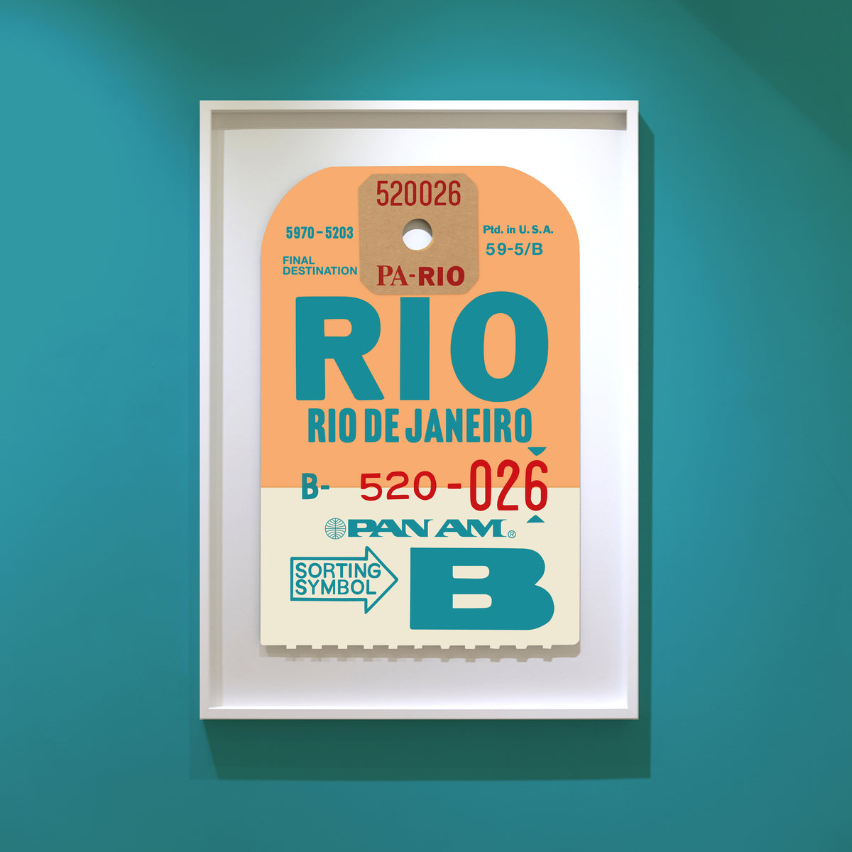 Limited-edition archival print of a Pan Am “RIO” luggage tag by Ella Freire, inspired by the original 1960s design, supersized in two framed sizes, float-mounted to enhance its three-dimensional effect; officially licensed by Pan Am with signed certificate included.