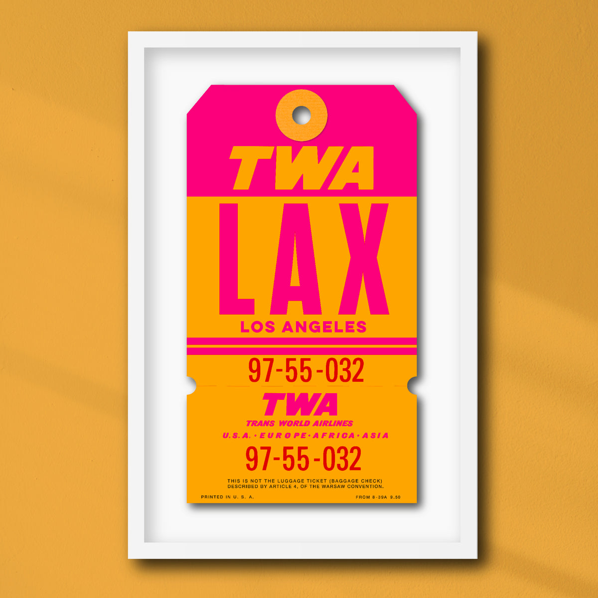 Limited-edition archival print of a TWA “Los Angeles” luggage tag by Ella Freire, inspired by the original 1960s design, supersized in one framed size only, float-mounted to enhance its three-dimensional effect; officially licensed by TWA (American Airlines) with signed certificate included.