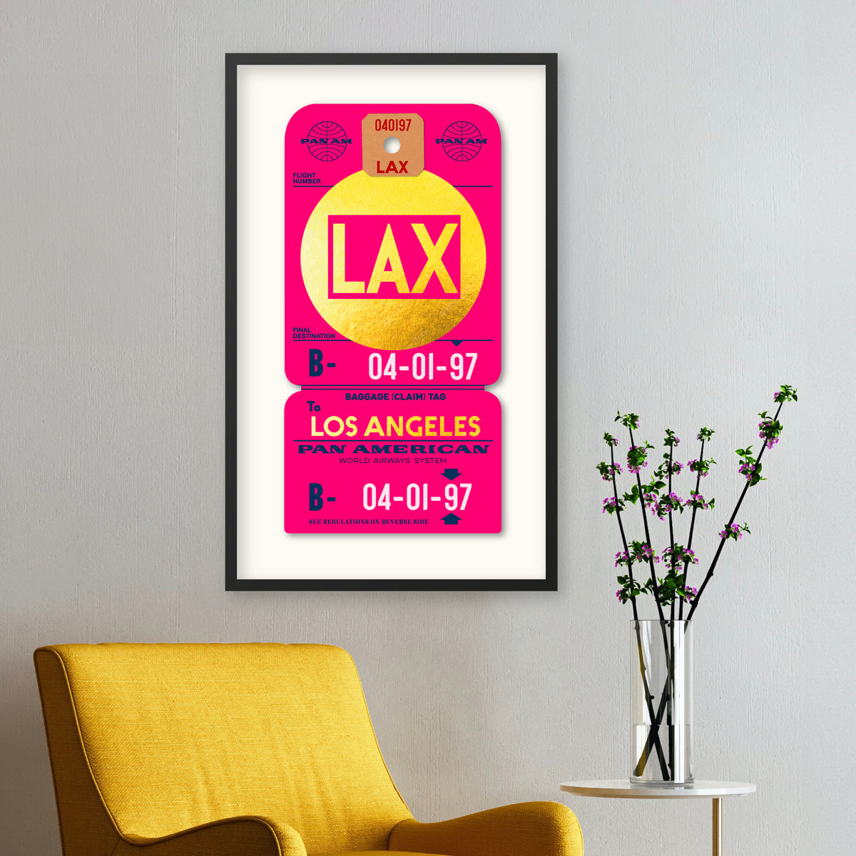 Limited Edition archival print of Pan Am “Los Angeles” luggage tag by Ella Freire, inspired by the 1960s art deco design, printed on shiny gold paper, float-mounted and framed to enhance the 3D effect; officially Pan Am licensed with signed certificate.
