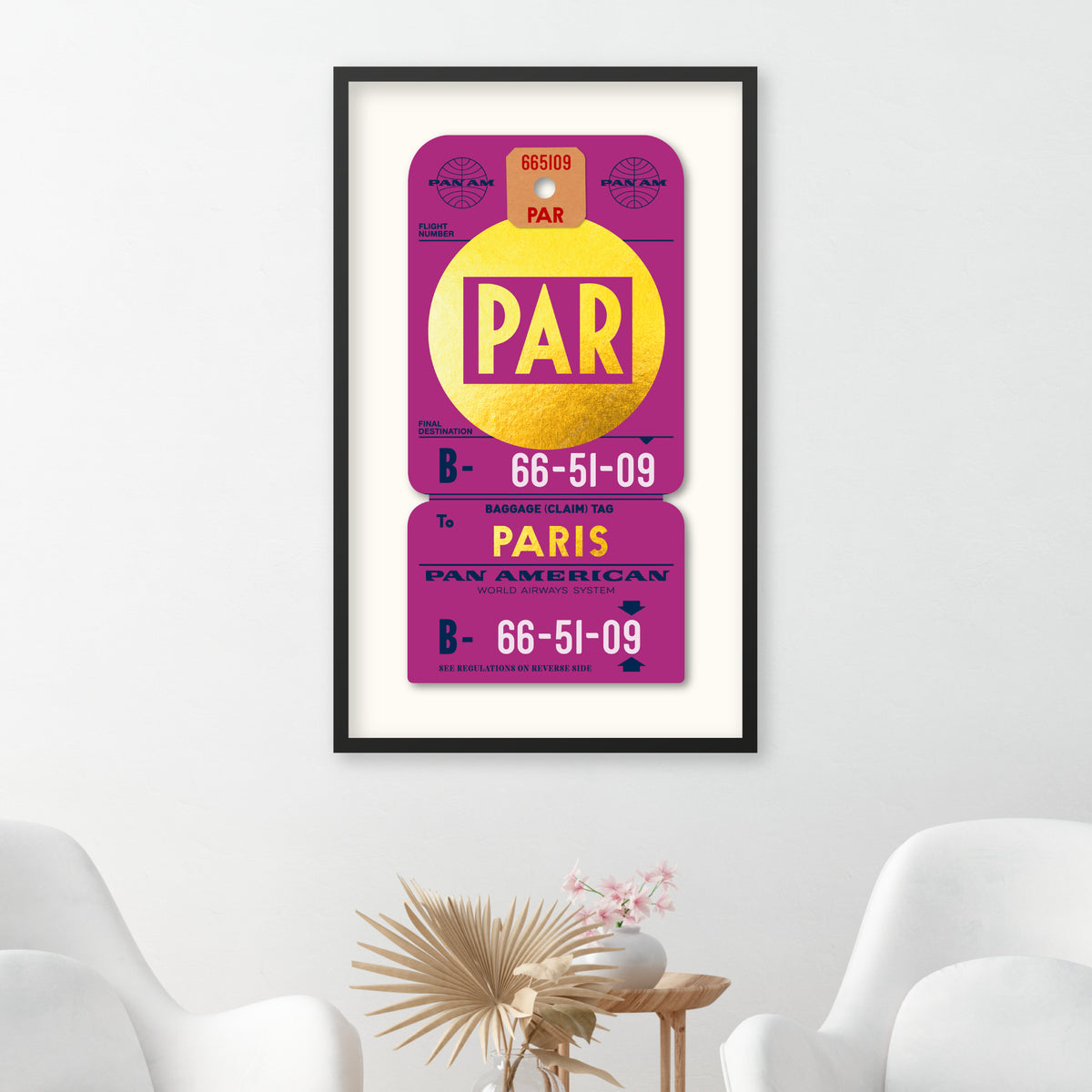 Limited Edition archival print of Pan Am “Paris” luggage tag by Ella Freire, inspired by the 1960s art deco design, printed on shiny gold paper, float-mounted and framed to enhance the 3D effect; officially Pan Am licensed with signed certificate.