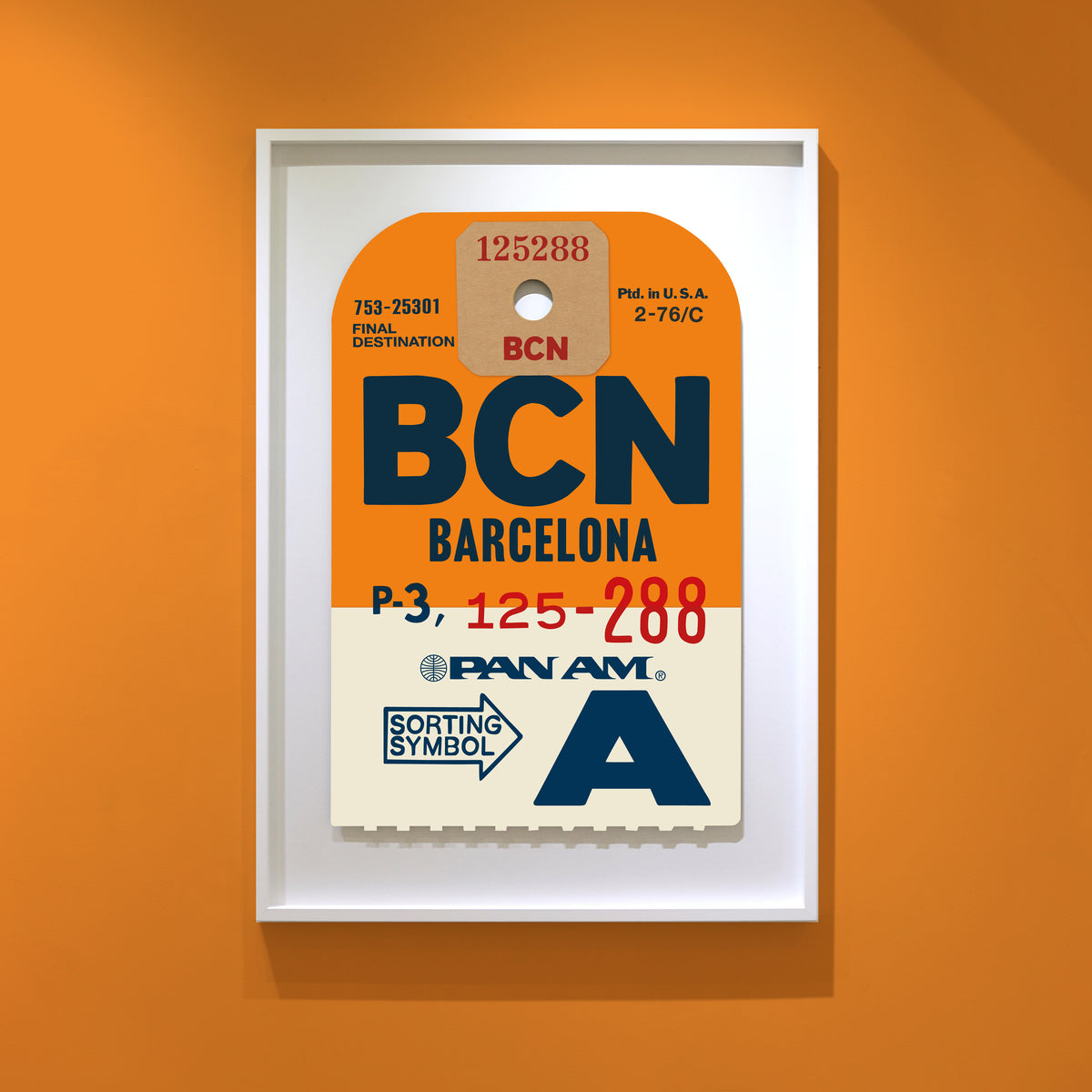 Limited-edition archival print of a Pan Am “Barcelona” luggage tag by Ella Freire, inspired by the original 1960s design, supersized in two framed sizes, float-mounted to enhance its three-dimensional effect; officially licensed by Pan Am with signed certificate included.