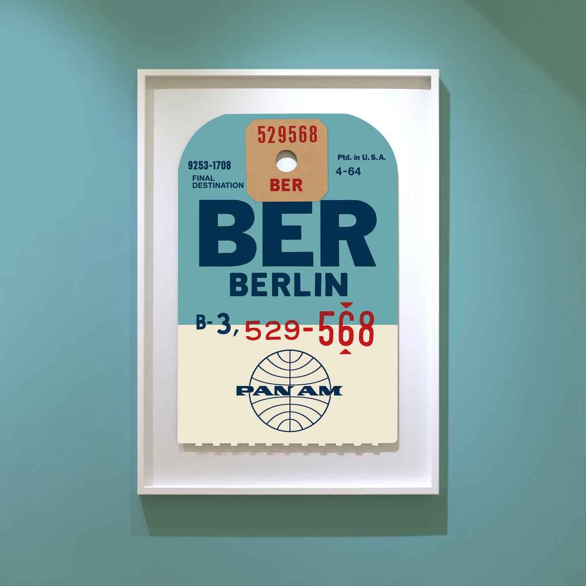 Limited-edition archival print of a Pan Am “Berlin” luggage tag by Ella Freire, inspired by the original 1960s design, supersized in two framed sizes, float-mounted to enhance its three-dimensional effect; officially licensed by Pan Am with signed certificate included.