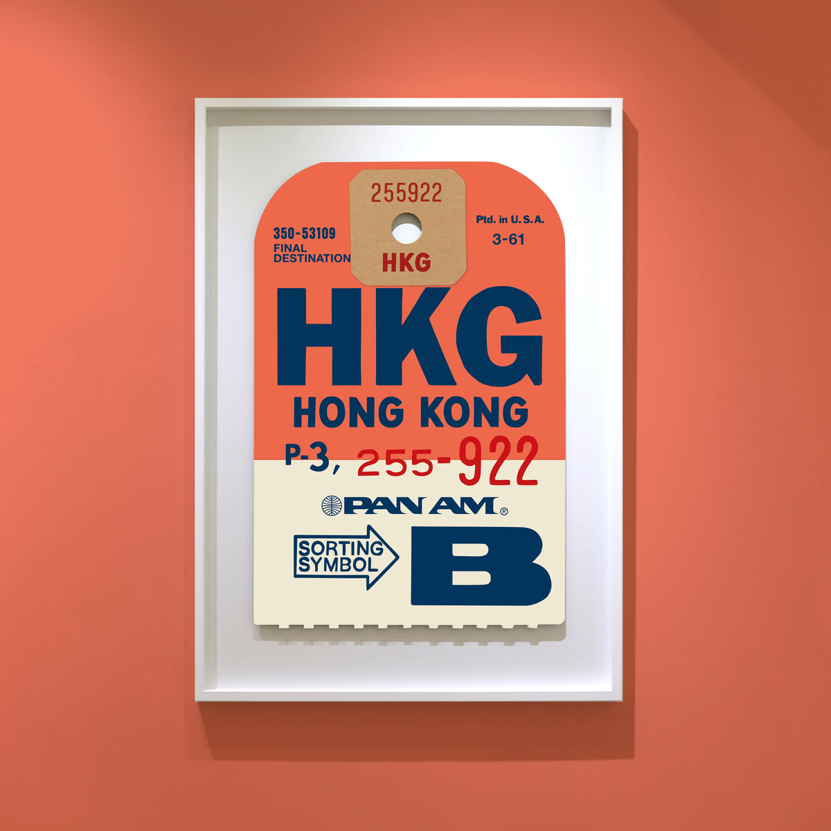 Limited-edition archival print of a Pan Am “Hong Kong” luggage tag by Ella Freire, inspired by the original 1960s design, supersized in two framed sizes, float-mounted to enhance its three-dimensional effect; officially licensed by Pan Am with signed certificate included.