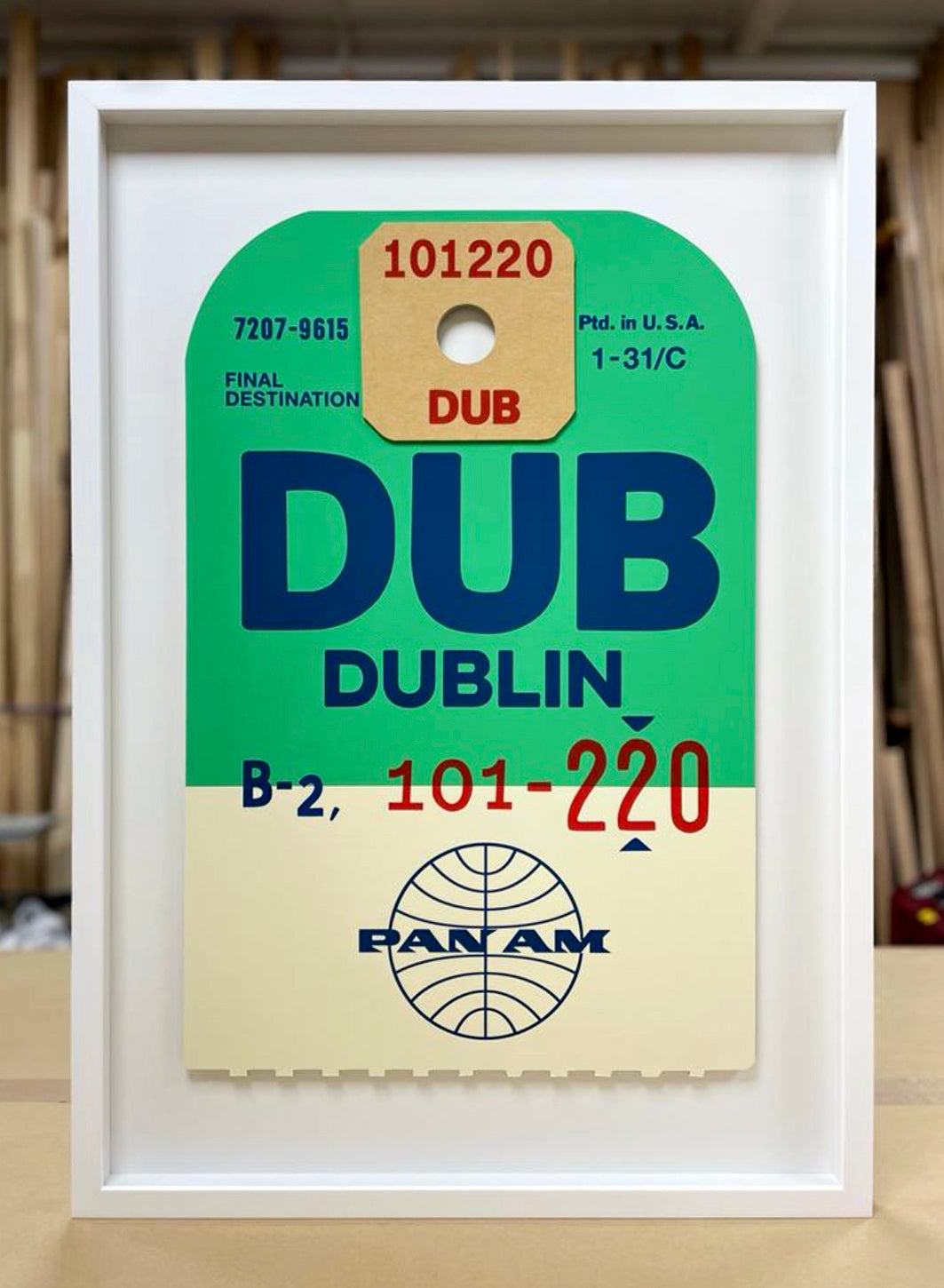 Limited-edition archival print of a Pan Am “Dublin” luggage tag by Ella Freire, inspired by the original 1960s design, supersized in two framed sizes, float-mounted to enhance its three-dimensional effect; officially licensed by Pan Am with signed certificate included.