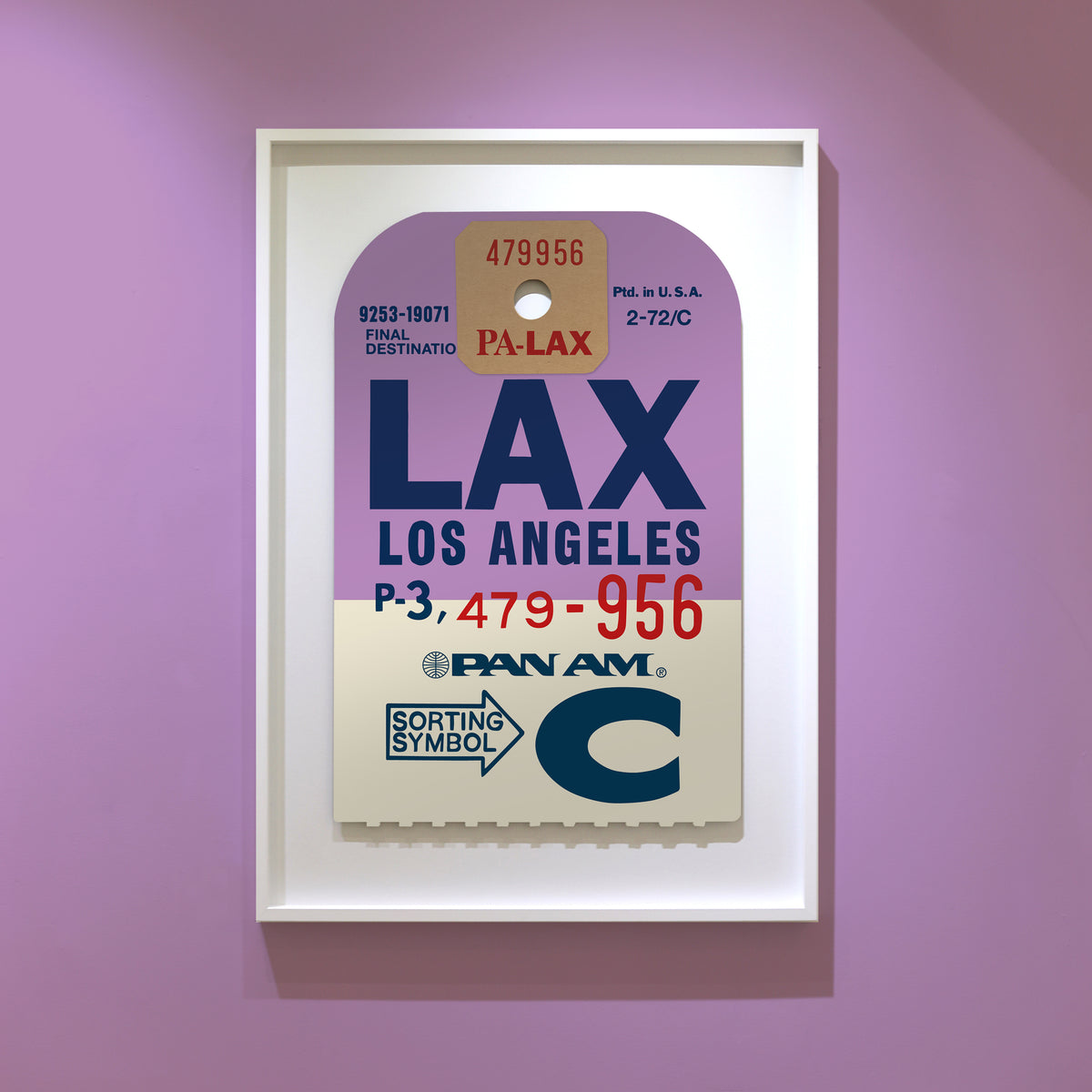 Limited-edition archival print of a Pan Am “Los Angeles” luggage tag by Ella Freire, inspired by the original 1960s design, supersized in two framed sizes, float-mounted to enhance its three-dimensional effect; officially licensed by Pan Am with signed certificate included.