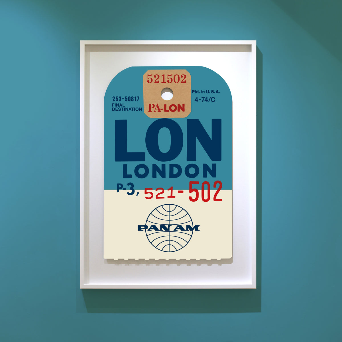 Limited-edition archival print of a Pan Am “London” luggage tag by Ella Freire, inspired by the original 1960s design, supersized in two framed sizes, float-mounted to enhance its three-dimensional effect; officially licensed by Pan Am with signed certificate included.