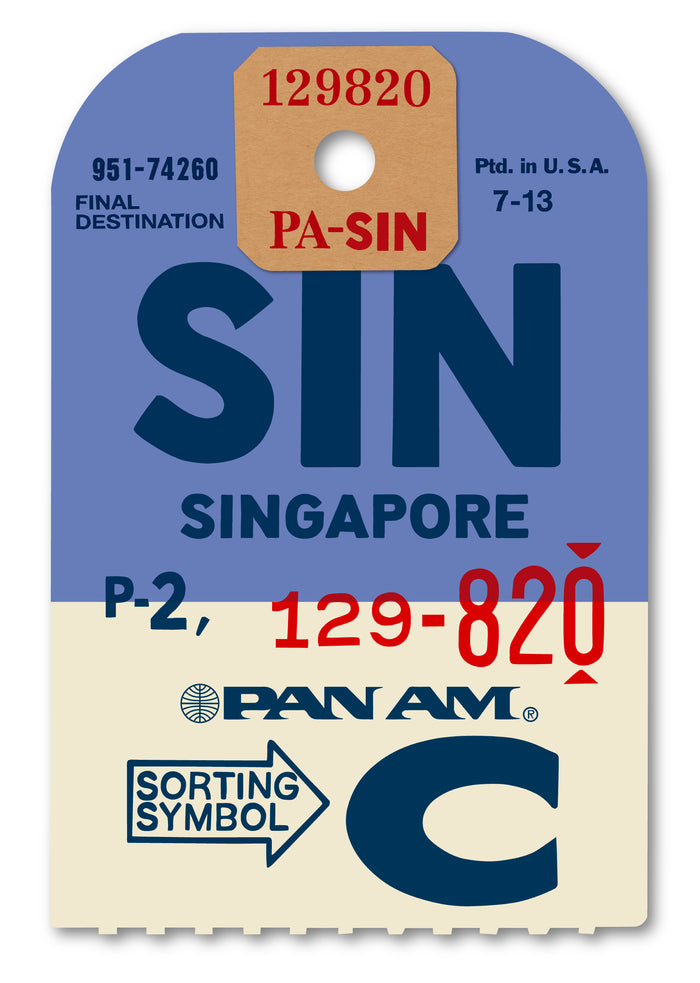 Limited-edition archival print of a Pan Am “Singapore” luggage tag by Ella Freire, inspired by the original 1960s design, supersized in two framed sizes, float-mounted to enhance its three-dimensional effect; officially licensed by Pan Am with signed certificate included.