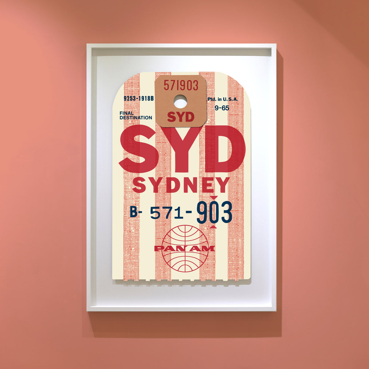Limited-edition archival print of a Pan Am “Sydney” luggage tag by Ella Freire, inspired by the original 1960s design, supersized in two framed sizes, float-mounted to enhance its three-dimensional effect; officially licensed by Pan Am with signed certificate included.