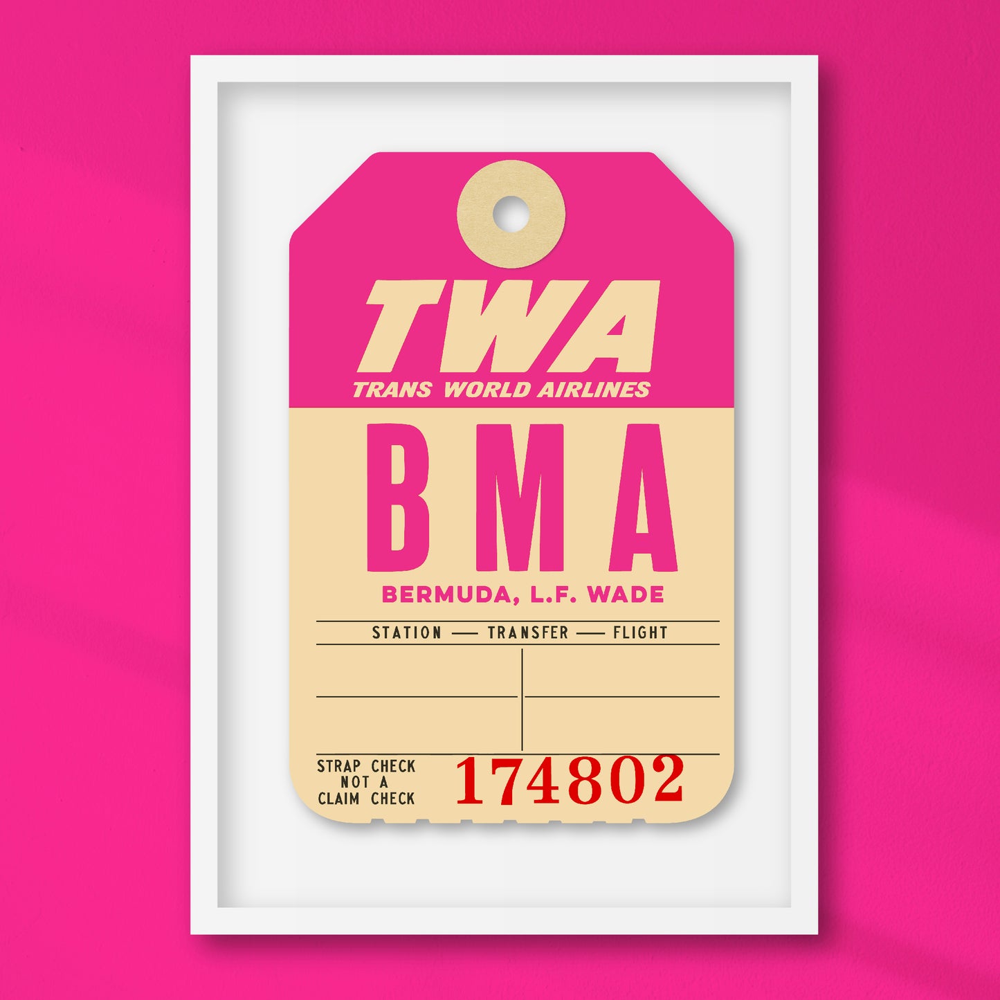 Limited-edition archival print of a TWA “Bermuda” luggage tag by Ella Freire, inspired by the original 1960s design, supersized in two framed sizes, float-mounted to enhance its three-dimensional effect; officially licensed by TWA (American Airlines) with signed certificate included.