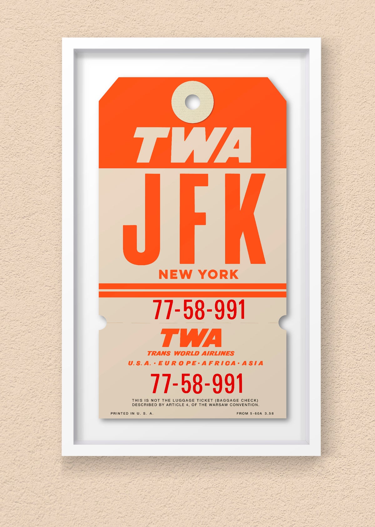 Limited-edition archival print of a TWA “JFK New York” luggage tag by Ella Freire, inspired by the original 1960s design, supersized in one framed size only, float-mounted to enhance its three-dimensional effect; officially licensed by TWA (American Airlines) with signed certificate included.