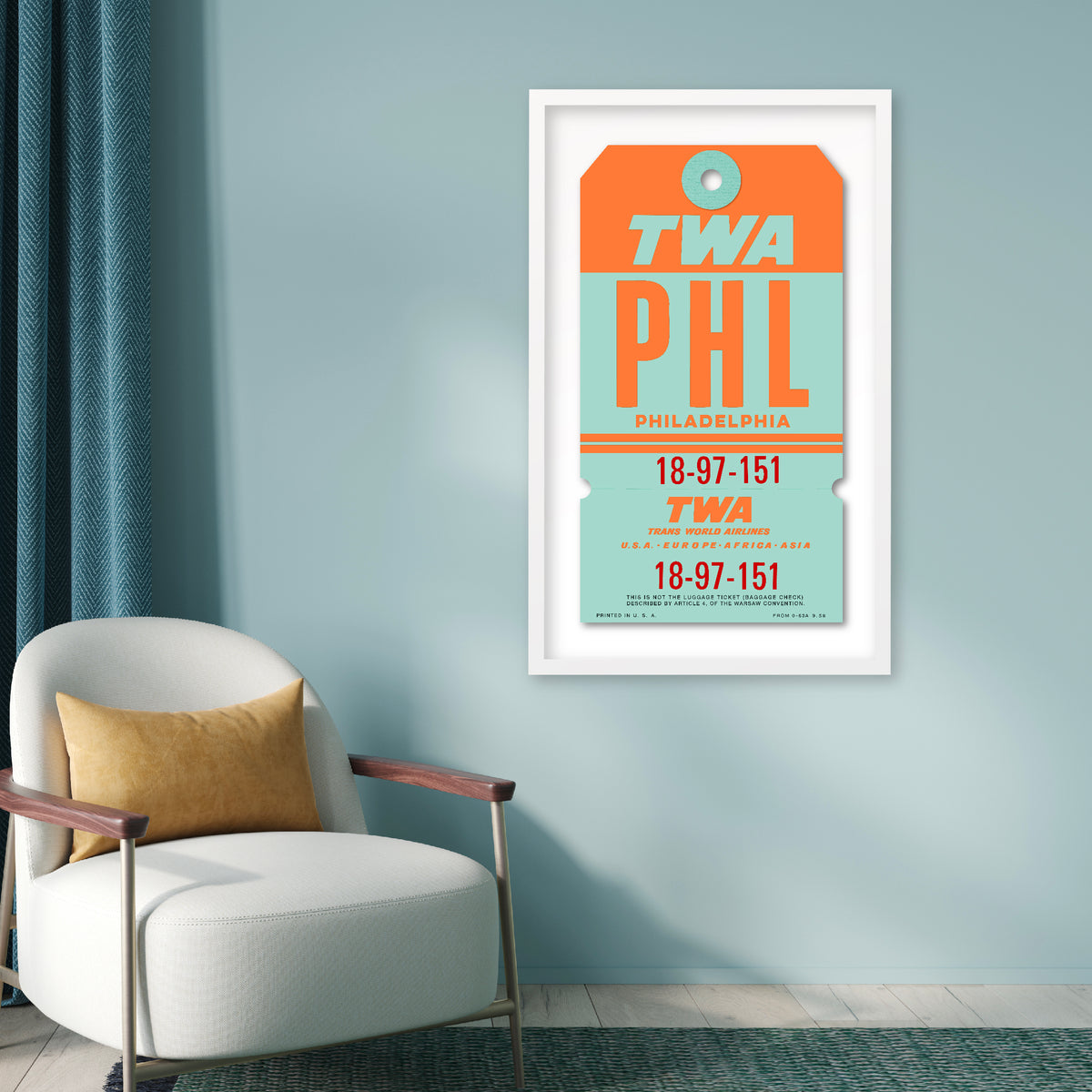 Limited-edition archival print of a TWA “Philadelphia” luggage tag by Ella Freire, inspired by the original 1960s design, supersized in one framed size only, float-mounted to enhance its three-dimensional effect; officially licensed by TWA (American Airlines) with signed certificate included.